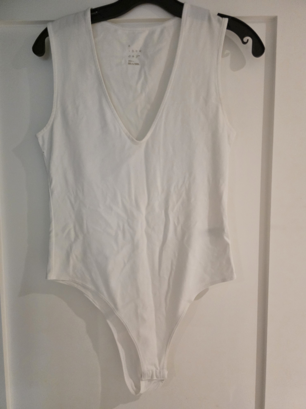 a new day White V‑Neck Sleeveless Bodysuit